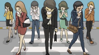 Des gens le nez rivé sur leur portable en traversant la rue. zombies smartphones portables rue