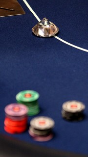 Des jetons un bouton en forme de diamant